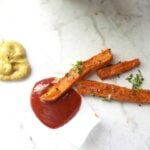 These Baked Garlic Sweet Potato Fries are a guilt free treat | VEGAN + GF | ThisSavoryVegan.com