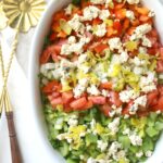 This Chopped Salad with Tofu Feta combines tons of veggies with a tangy dressing and faux feta | VEGAN + GF | ThisSavoryVegan.com