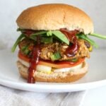 These Spicy Black Bean Burgers are simple, tasty and vegan! Make them ahead of time and keep them in the freezer for an easy weeknight dinner! | ThisSavoryVegan.com