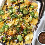 These Loaded Vegan Nachos are packed with healthy ingredients and are the perfect snack to share on game day | ThisSavoryVegan.com