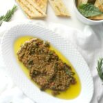 This Simple Vegan Mediterranean Spread is filled with fresh herbs and sun-dried tomatoes and can be served on sandwiches, as a dip or even with pasta | ThisSavoryVegan.com