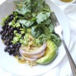 For a quick and easy meal try these Black Bean Quinoa Buddha Bowls with Salsa Verde Vinaigrette. Healthy, simple and easy to customize | ThisSavoryVegan.com