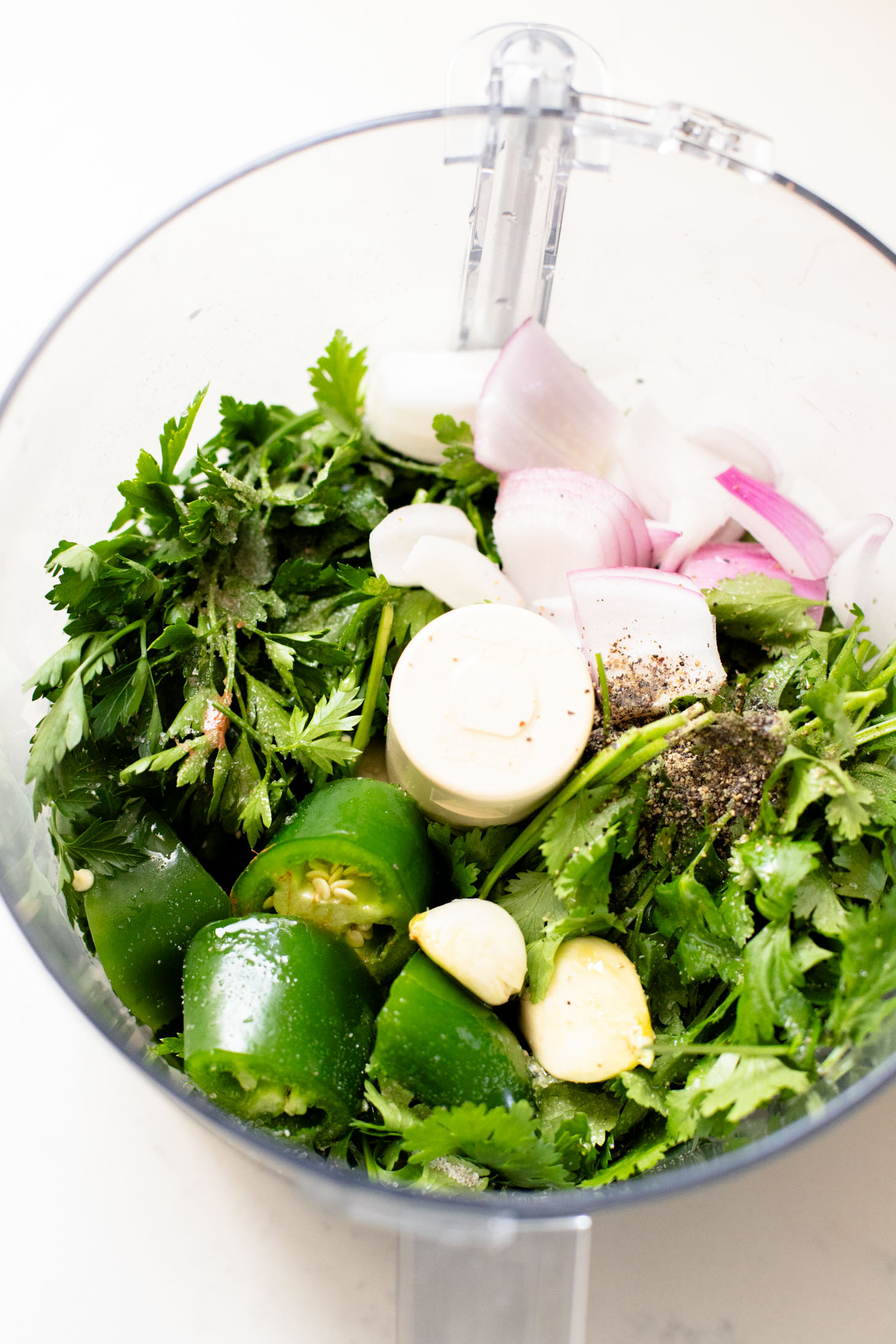 Increase the flavor of any meal with this super simple Chimichurri Sauce - made with fresh cilantro, parsley, garlic and red onion | ThisSavoryVegan.com