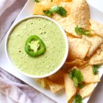 The perfect addition to tacos, nachos or enchiladas - this Vegan Jalapeño Cream Sauce is packed full of flavor and heat | ThisSavoryVegan.com