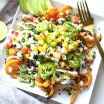 All of your favorite taco flavors come together with these Loaded Vegan Taco Fries. A fun game day snack or quick dinner #vegan #gamedaysnacks | ThisSavoryVegan.com