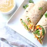 These Veggie Thai Wraps with Spicy Peanut Sauce make a simple and delicious lunch, snack or dinner. Perfect for back to school! | ThisSavoryVegan.com