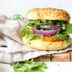Switch up your typical breakfast with this Hash Brown Breakfast Bagel with Vegan Sriracha Mayo. A crunchy, spicy twist on a breakfast sandwich | ThisSavoryVegan.com #vegan #veganbreakfast