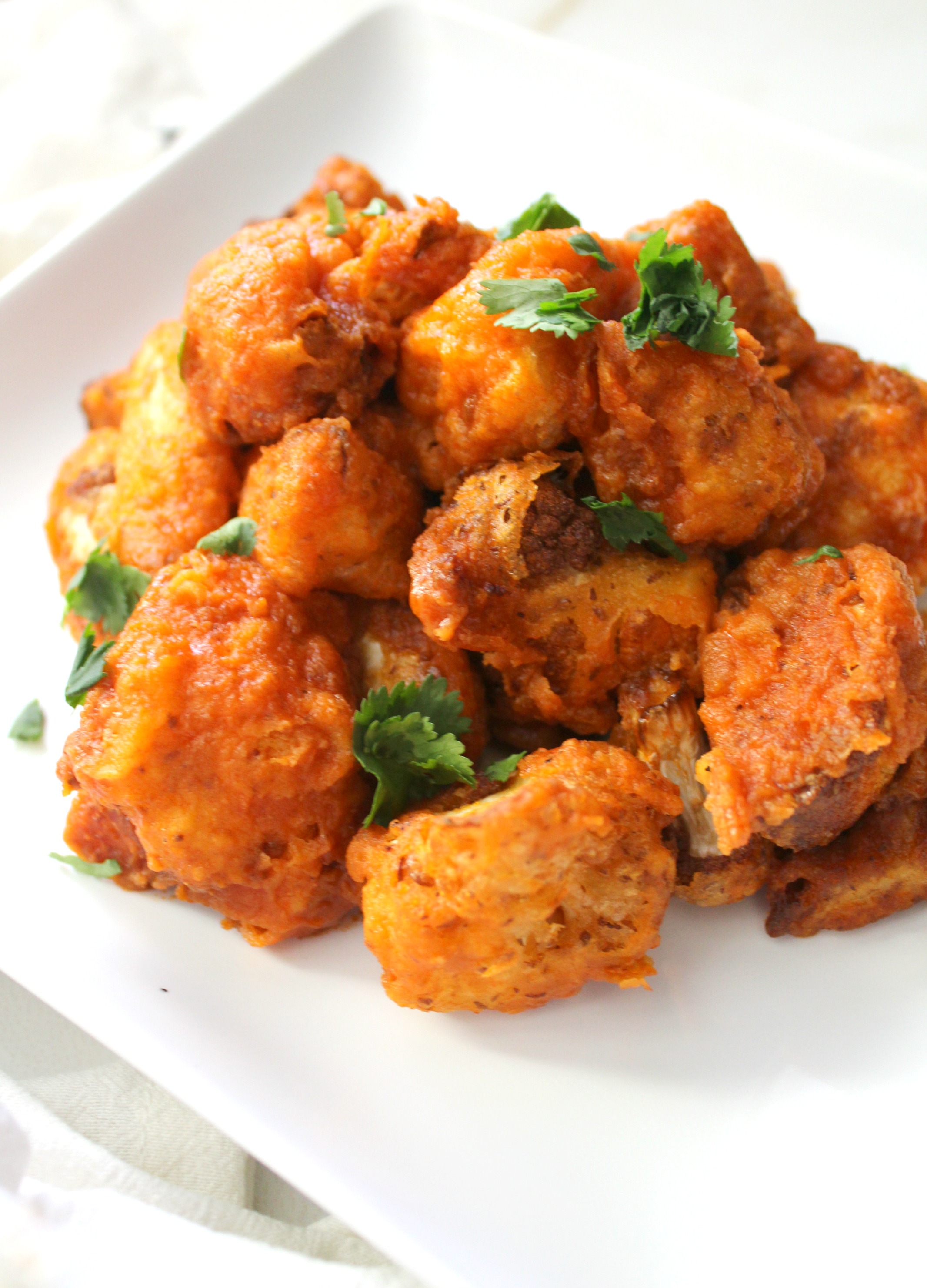These Beer Battered Cauliflower Buffalo Wings are the perfect balance of spice and crunch. A vegan game day recipe that everyone will love! | ThisSavoryVegan.com #vegan #gameday