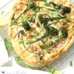 Restaurant-quality pizza with easy to find ingredients - this Broccolini & Shallot Vegan White Pizza is loaded with seasoned white sauce, crispy shallots and perfectly cooked broccolini | ThisSavoryVegan.com #vegan #veganpizza