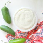 This Spicy Tahini Dressing is the perfect creamy addition to your favorite salads or bowls. With just the perfect amount of heat to give your dish a little kick | ThisSavoryVegan.com #thissavoryvegan #dressing #vegan