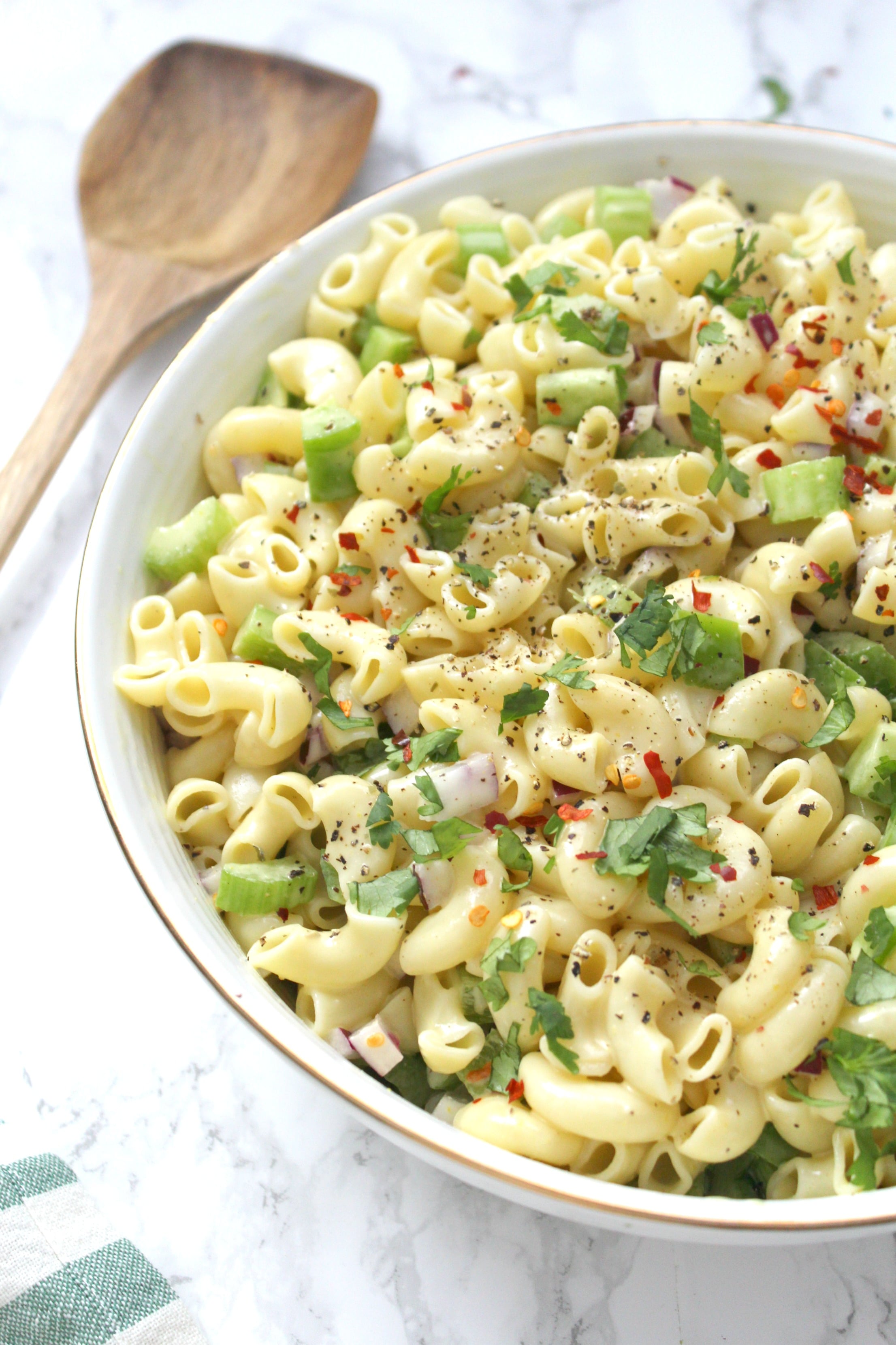 This Vegan Macaroni Salad is a lighter, vegan-ized version of a classic BBQ staple. This is a total crowd pleaser | ThisSavoryVegan.com #thissavoryvegan #bbq #sidedish
