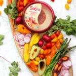 How to build a veggie hummus board - it is easier than you think when you have in season veggies and pre-made hummus at hand | ThisSavoryVegan.com #thissavoryvegan #hummusveggieboard #veganappetizer