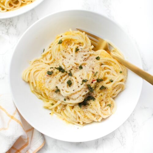 This Creamy Vegan Butternut Squash Pasta with Fried Sage is the perfect comforting Fall meal. With just a few ingredients and one hour, you will have a decadent and tasty pasta dish | ThisSavoryVegan.com #thissavoryvegan #veganpasta