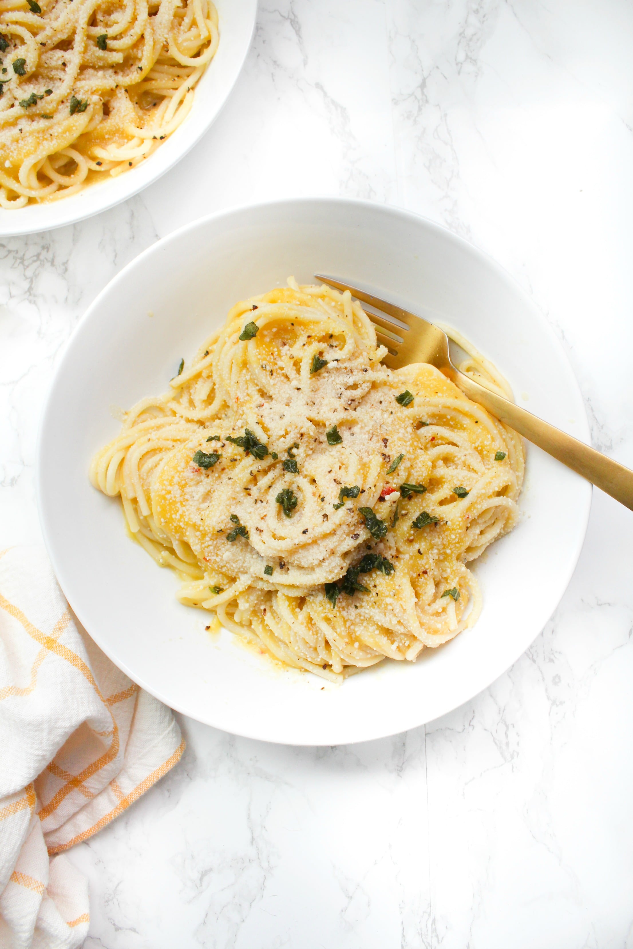 This Creamy Vegan Butternut Squash Pasta with Fried Sage is the perfect comforting Fall meal. With just a few ingredients and one hour, you will have a decadent and tasty pasta dish | ThisSavoryVegan.com #thissavoryvegan #veganpasta