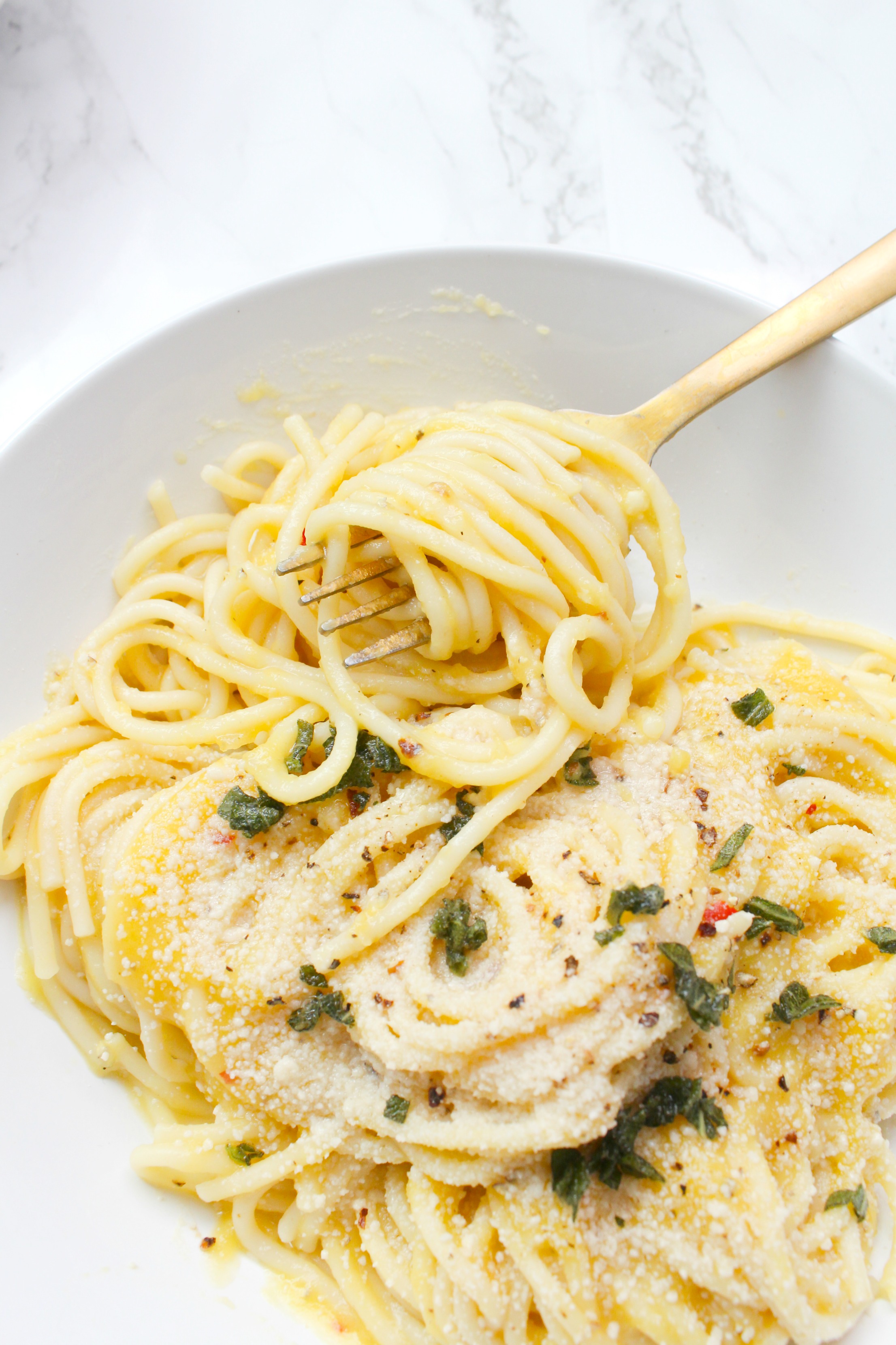 This Creamy Vegan Butternut Squash Pasta with Fried Sage is the perfect comforting Fall meal. With just a few ingredients and one hour, you will have a decadent and tasty pasta dish | ThisSavoryVegan.com #thissavoryvegan #veganpasta