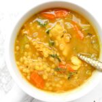 This Vegan Chicken Couscous Soup is healthy, comforting and perfect for cold season. Next time you're feeling sick or it is a cold winter night, make this soup to feel warm and toasty | ThisSavoryVegan.com #thissavoryvegan #vegansoup #coldbuster