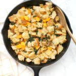 Make this Thanksgiving one to remember with this Vegan Sausage Kale Skillet Dressing. Filled with wilted kale, butternut squash and zesty vegan Italian sausage | ThisSavoryVegan.com #thissavoryvegan #veganthanksgiving #thanksgiving