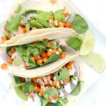 A 20 minute dinner that will have you going back for seconds - these Buffalo Chickpea Tacos with Vegan Ranch are simple & delicious | ThisSavoryVegan.com #thissavoryvegan #buffalotacos #tacotuesday