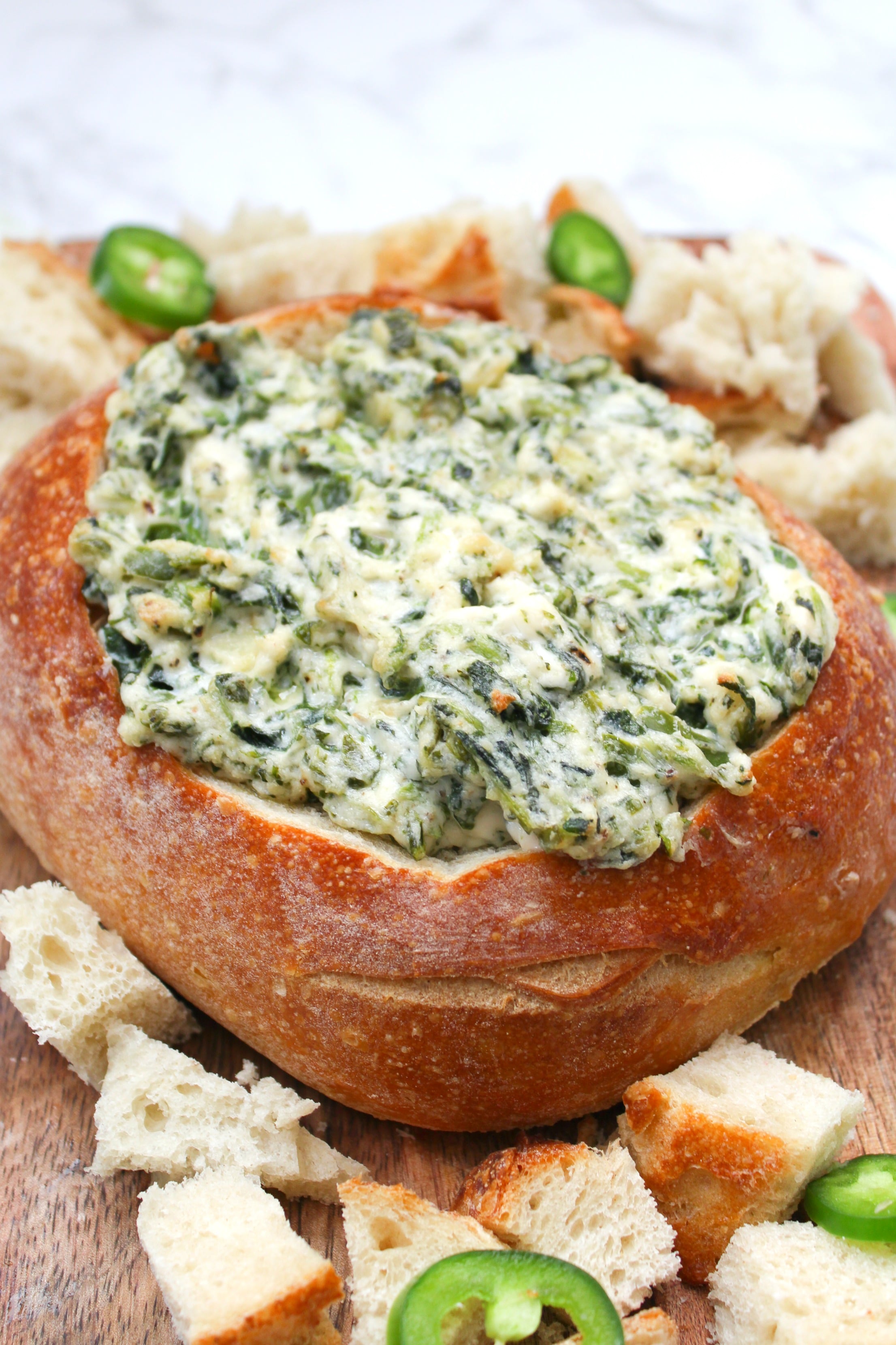 This Vegan Jalapeño Spinach Dip is the perfect game day or party snack. No one will ever know this creamy deliciousness is even vegan | ThisSavoryVegan.com #thissavoryvegan #veganspinachdip