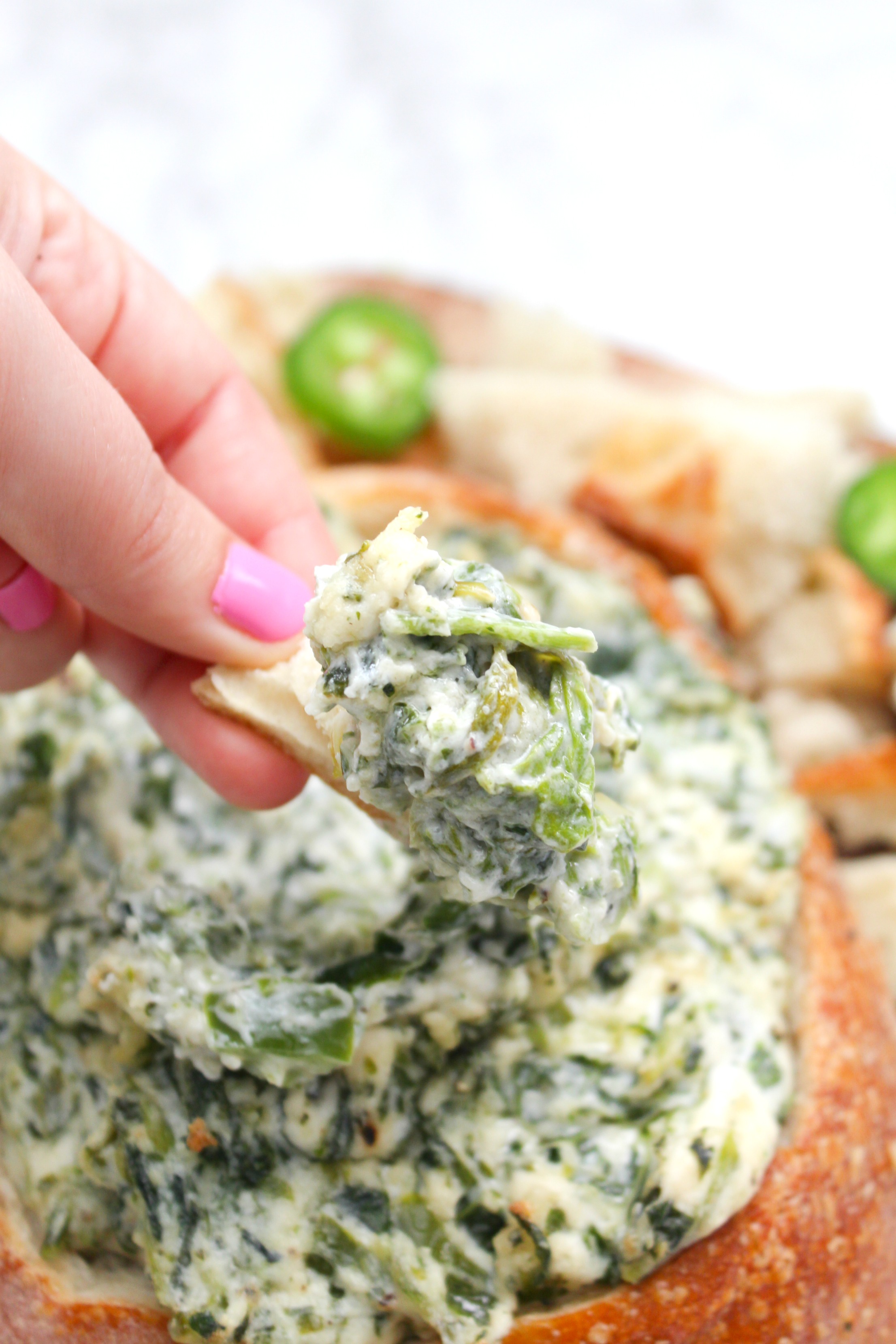 This Vegan Jalapeño Spinach Dip is the perfect game day or party snack. No one will ever know this creamy deliciousness is even vegan | ThisSavoryVegan.com #thissavoryvegan #veganspinachdip