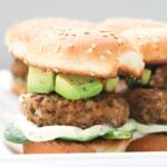 These Zesty Brown Rice Black Bean Vegan Sliders with Basil Aioli are the perfect party appetizer. Topped off with an avocado & tomato salsa | ThisSavoryVegan.com #thissavoryvegan #vegan #sliders