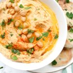 This Zesty Homemade Hummus is a simple recipe that packs a kick. Making hummus at home only requires a few ingredients and 15 minutes! | ThisSavoryVegan.com #thissavoryvegan #hummus