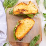 These Roasted Tomato Sandwiches with Vegan Lemon Garlic Aioli are loaded with avocado, arugula and some of the tastiest tomato slices | ThisSavoryVegan.com #thissavoryvegan #vegansandwiches #vegan