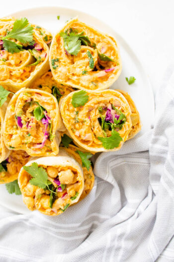 These Vegan Buffalo Chickpea Salad Pinwheels are the ultimate party snack or make-ahead lunch. Slightly spicy, perfectly crunchy and healthy | ThisSavoryVegan.com #thissavoryvegan #pinwheels #veganlunch