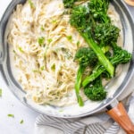 This Vegan Cauliflower Alfredo Pasta with Broccolini is a healthy take on traditional alfredo pasta that tastes creamy and decadent without the extra calories | ThisSavoryVegan.com #thissavoryvegan #vegan #veganalfredo #veganpasta