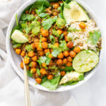 These Chickpea Lentil Taco Rice Bowls are filled with brown rice, spinach, roasted chickpeas & vegan taco lentil meat. All topped off with chimichurri | ThisSavoryVegan.com #thissavoryvegan #veganrecipe #vegantacobowl
