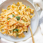 This Creamy Vegan White Bean Pasta requires just a few staple ingredients and is easy to adjust based on what you have on hand | ThisSavoryVegan.com #thissavoryvegan #veganpasta #simplevegandinner