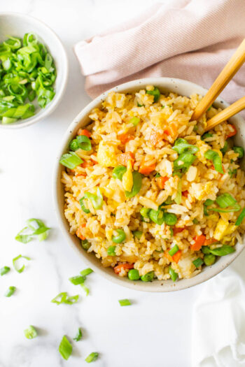 Vegan Fried Rice is not only super easy to make it is also SUPER tasty. With a few easy swaps you can have a better than take-out vegan meal at home | ThisSavoryVegan.com #thissavoryvegan #veganfriedrice