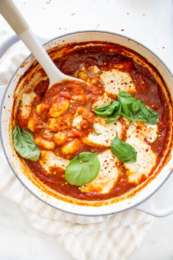 This Baked Gnocchi with Vegan Tofu Ricotta is a saucy casserole that is best served with rosemary garlic bread and a big green salad on the side | ThisSavoryVegan.com #thissavoryvegan #vegancasserole #gnocchi