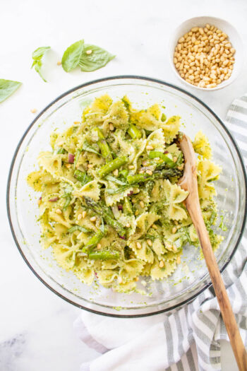 This Grilled Asparagus Pesto Pasta Salad is the perfect side dish for your next vegan BBQ. Homemade vegan pesto, crisp asparagus and chilled pasta | ThisSavoryVegan.com #thissavoryvegan #veganpastasalad #pestopastasalad