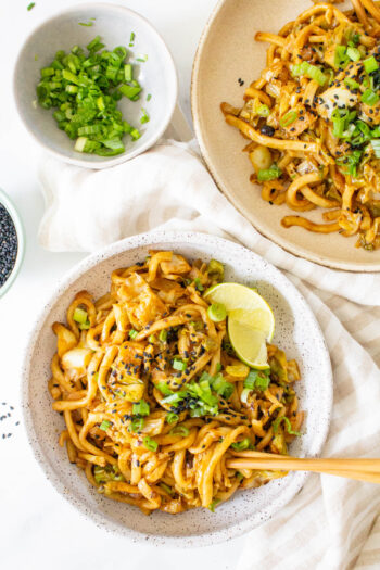 This Vegan Udon Noodle Cabbage Stir Fry is a quick weeknight dinner that is better than takeout. Ready in less than 30 minutes | ThisSavoryVegan.com #thissavoryvegan #veganstirfry #udon