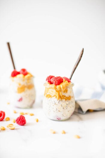 These Peanut Butter & Jelly Overnight Oats are the perfect healthy vegan breakfast or snack. Made with fresh raspberries and topped with crunchy peanuts | ThisSavoryVegan.com #thissavoryvegan #overnightoats #healthybreakfast