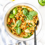 This Spicy Vegan Garlic Pasta with Roasted Chickpeas is the ultimate quick vegan dinner. Simple ingredients in a light & spicy garlicky sauce | ThisSavoryVegan.com #thissavoryvegan #veganpasta #chickpeas