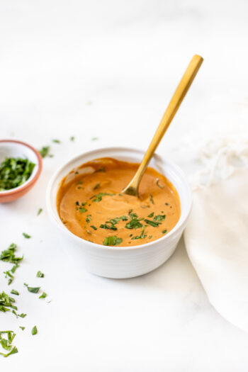 This Chipotle Ginger Cashew Dressing is zesty, creamy and totally tasty. Use this vegan dressing on salads, bowls or as a dipping sauce | ThisSavoryVegan.com #thissavoryvegan #cashewdressing #vegandressing