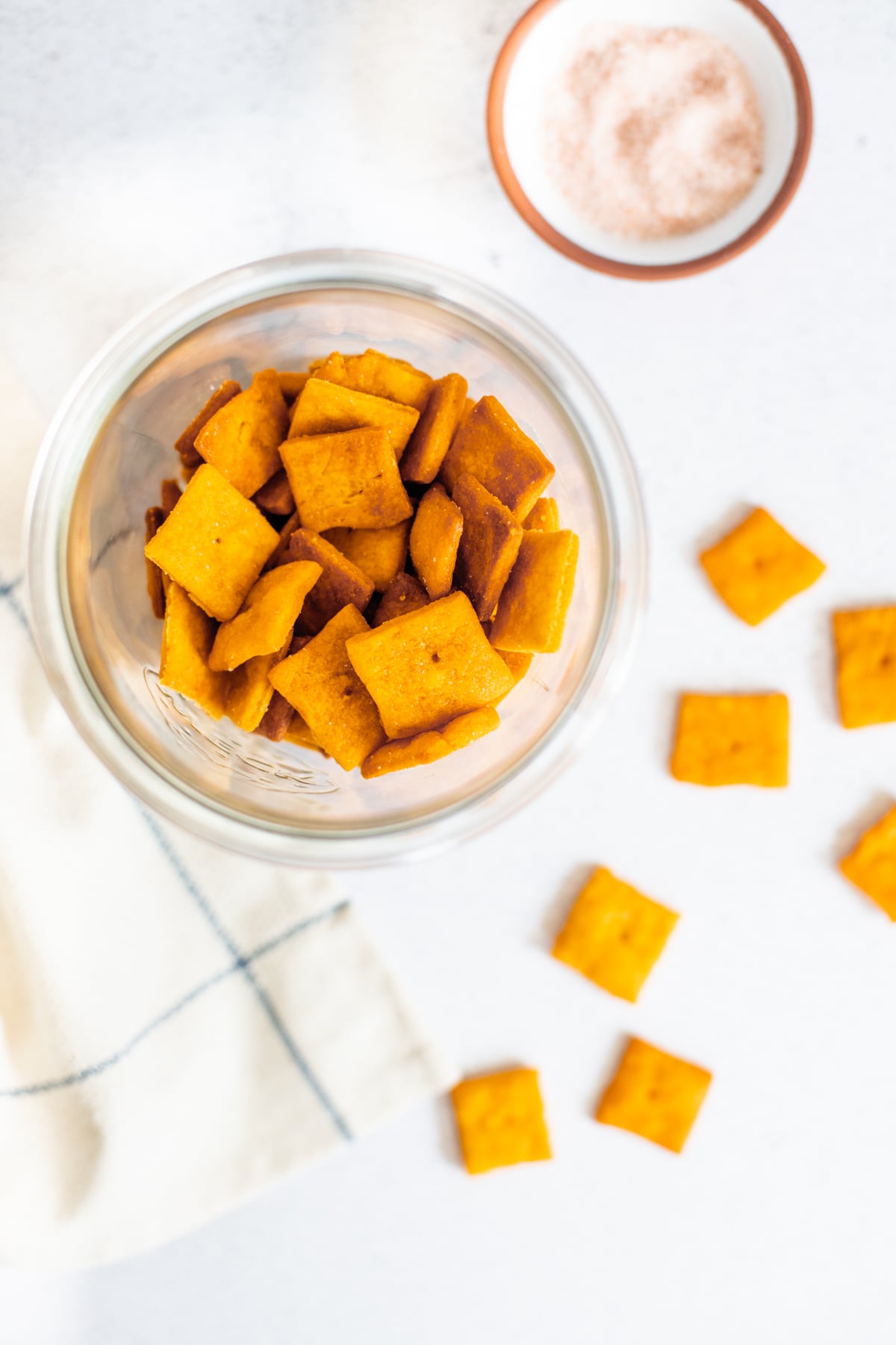 This Vegan Cheez-Its Recipe is a fun snack you can make at home. With just a few simple ingredients, you will have crispy, cheesy vegan crackers ready to eat | ThisSavoryVegan.com #thissavoryvegan #cheezitrecipe #vegancrackers