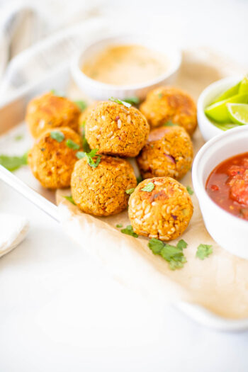 These Zesty Vegan Chickpea Meatballs are crispy, hearty and healthy. Made with chickpeas, pistachios, brown rice, herbs and spices. Serve with pasta, salads or bowls | ThisSavoryVegan.com #thissavoryvegan #chickpeas #veganmeatballs