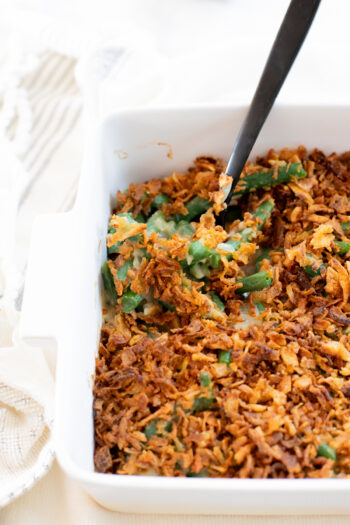This is literally the BEST Vegan Green Bean Casserole I have ever had. It is comforting, creamy and crunchy all at the same time. Perfect holiday side | ThisSavoryVegan.com #thissavoryvegan #veganthanksgivingrecipes #veganthanksgivingside