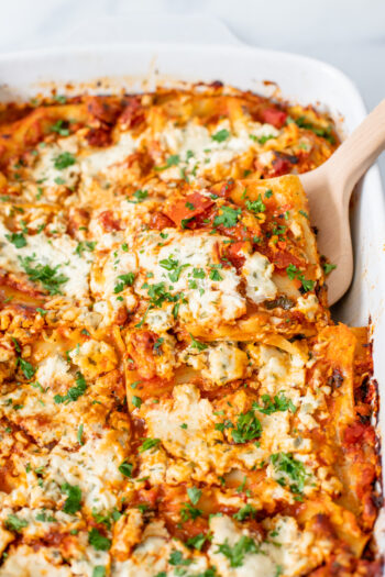 Are you ready for The Ultimate Vegan Lasagna? Loaded with vegan sausage, vegan ricotta and spinach. Plus a secret ingredient for a cheesy topping | ThisSavoryVegan.com #thissavoryvegan #veganlasagna #vegandinnerideas