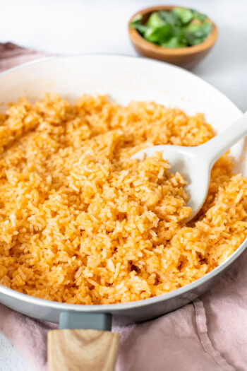This Simple Vegan Mexican Rice is made with simple ingredients and tastes just like authentic Mexican rice from a restaurant. Perfect side dish | ThisSavoryVegan.com #thissavoryvegan #mexicanrice #vegansidedish