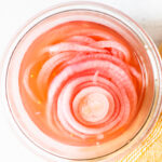 These Quick Pickled Onions are made with simple ingredients and ready in 30 minutes. The perfect topping for burgers, tacos and salads | ThisSavoryVegan.com #thissavoryvegan #pickledonions #easypickledonions