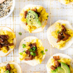 These Vegan Breakfast Bagel Bites are a super fun weekend breakfast - mini bagels loaded with vegan eggs, tempeh bacon & all the toppings | ThisSavoryVegan.com #thissavoryvegan #veganbrunch #veganbreakfast