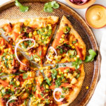 This Soyrizo Pizza with Vegan Chipotle Ranch is hearty, spicy and tasty. This no-cheese pizza combines colorful veggies with spicy soyrizo on a crispy crust | ThisSavoryVegan.com #thissavoryvegan #veganpizza #vegandinnerideas