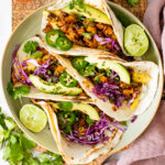 The perfect savory breakfast - these Vegan Potato & Egg Breakfast Tacos have veggies, soyrizo, scrambled vegan eggs and plenty of toppings | ThisSavoryVegan.com #thissavoryvegan #vegantacos #breakfasttacos