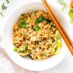 This Vegan Sesame Ginger Fried Rice is packed with flavor and bulked up with mushrooms and bok choy. A quick snack or side dish | ThisSavoryVegan.com #thissavoryvegan #friedrice #vegansides