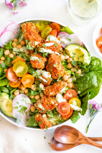 This Pretzel Crusted Buffalo Tempeh Salad has crunchy veggies, buffalo pretzel crusted tempeh and a creamy vegan ranch dressing. The perfect vegan salad | ThisSavoryVegan.com #thissavoryvegan #tempehrecipes #buffalosalad