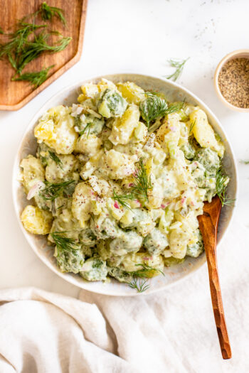 This Vegan Gnocchi Potato Salad is a fun twist on a summer classic. Made with potato gnocchi, kale gnocchi and a creamy mustard sauce | ThisSavoryVegan.com #thissavoryvegan #veganpotatosalad #veganbbqsides